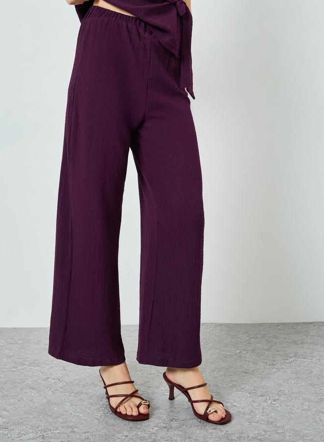 ستايلي طقم من بلوزة بارزة الملمس وبنطال بأرجل واسعة - Image 3